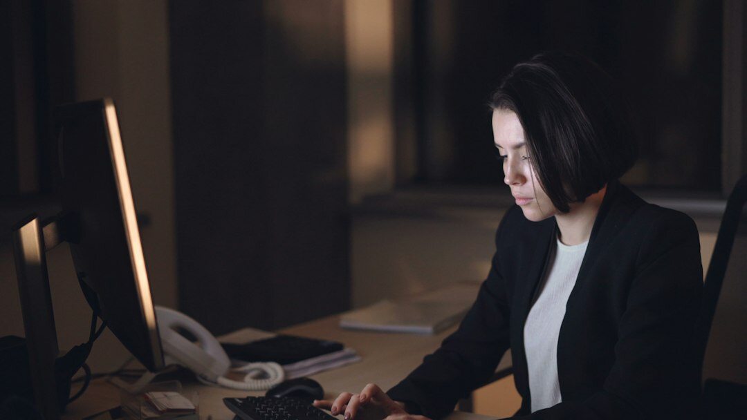 investigator analyzing data on computer